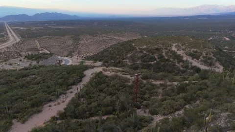 Aerial shot of Cable Carril mining structures winding through the landscape and Stock Footage 321734512