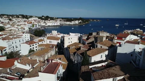 Aerial shot of Cadaques, going down through the houses Stock Footage 137009962