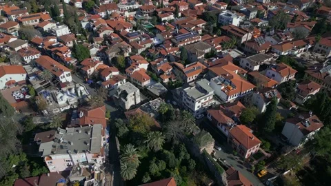 Aerial shot the camera flies forward over the roofs of the old town Stock Footage 229581666