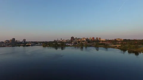 Aerial shot of Camera flying backwards revealing an old train bridge. 動画素材 52303791