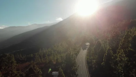 Aerial shot. Camera movement down. At sunset in the mountains. Winding mountain Video stock 103424571