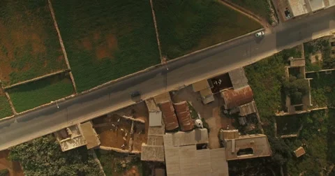 Aerial Shot - Camera moving downwards over a quiet street Stock Footage 61226107