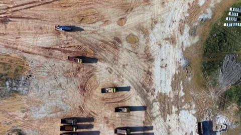 An aerial shot captures construction site with heavy machinery Stock Footage 342649956