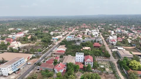 This aerial shot captures a developing urban area, likely in Siem Reap 動画素材 309305240