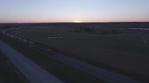 Aerial shot cargo train moving during sunset Stock Footage 60132993