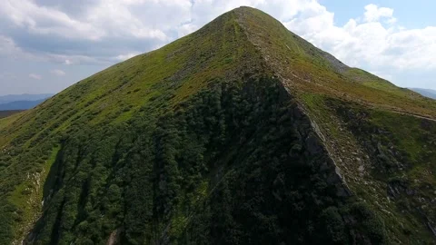 Aerial shot of a Carpathian mountain with a sharp ridge in summer Stock Footage 86323299