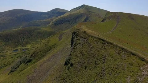 Aerial shot of the Carpathian Mountains with a sharp peaks and steep slopes Stock Footage 86796897