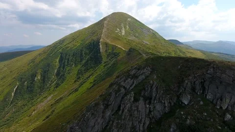 Aerial shot of a Carpathian peak with a sharp ridge in summer Stock Footage 86323128