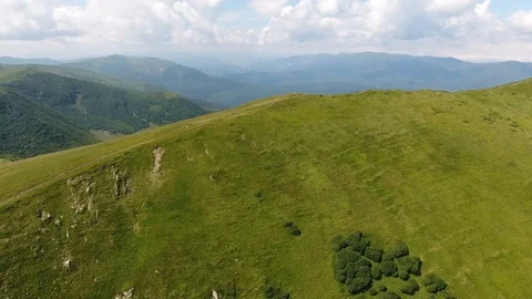 Aerial shot of the Carpathian range with sharp crest and steep slopes in summer Stock Footage 93695785
