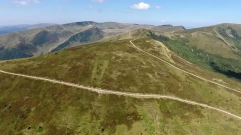 Aerial shot of the Carpathian ridge with a triangular plateau on it in summer Stock Footage 86604905