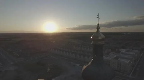 Aerial shot cathedral camera circle around the tip during sunset 2 Stock Footage 61109891
