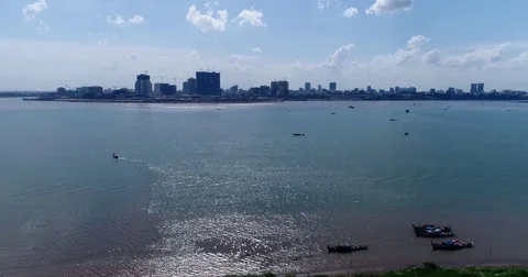 Aerial shot of the center of Phnom Penh and the Mekong river Stock Footage