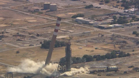 Aerial shot of chimney stack blowing up Video stock 34632079