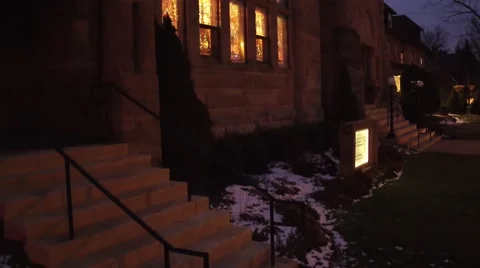 Aerial shot of church during Christmas season at night Stock Footage 59169725