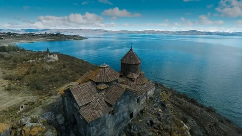 Aerial shot of church on sevan lake Stock Footage 102008130