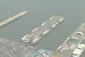 Aerial shot of Circle Line Sightseeing boats moored at their pier Footage