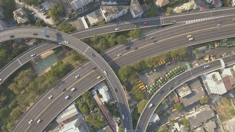 Aerial shot of city traffic on elevated road intersection 動画素材 73865488