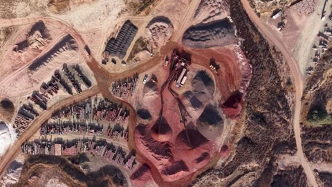 Aerial Shot of Clay Mining Operation With Machinery and Stockpiles in Rugged Stock Footage 344322498