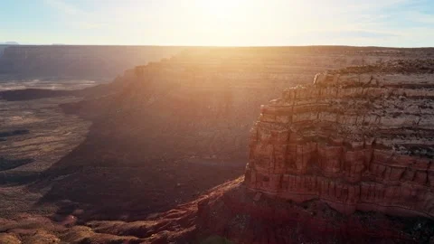 Aerial shot of the cliffs along the edge of Cedar Mesa in Southern Utah Stock Footage 337435651