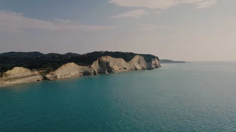 Aerial shot of Cliffs in Logas beach Peroulades, Greece Stock Footage 111819156