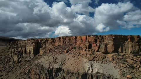 Aerial Shot Of Cloud Movement Casting Shadows Across Patagonia Terrain Vídeos de archivo 332599728