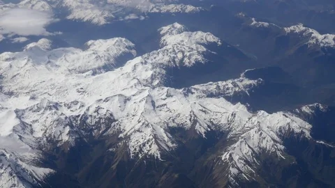 Aerial shot cloud snow mountain airplane 4k background winter 스톡 동영상 73205872