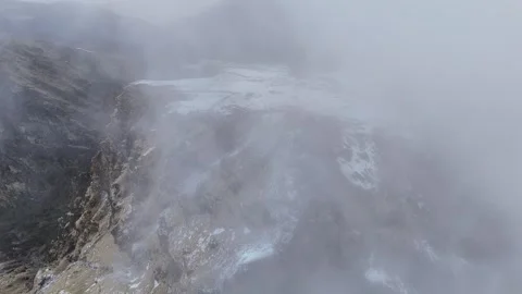 Aerial shot of clouds moving in Mountains of Uttarakhand, India Stock-Footage 344689550