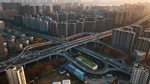 Aerial shot of complex freeway interchange with flowing traffic in Hangzhou Video stock 325079755