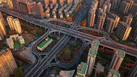 Aerial shot of complex freeway interchange with flowing traffic in Hangzhou Vídeos de archivo 332831994