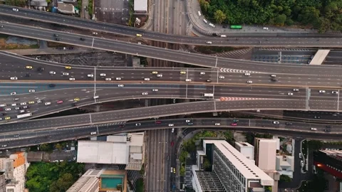 Aerial shot of a complex highway interchange and busy city traffic, Bangkok Stock Footage 310874069