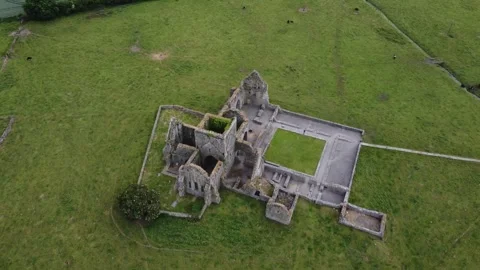 Aerial shot of a complex stone ruin structure with courtyards. Stock Footage 327624111