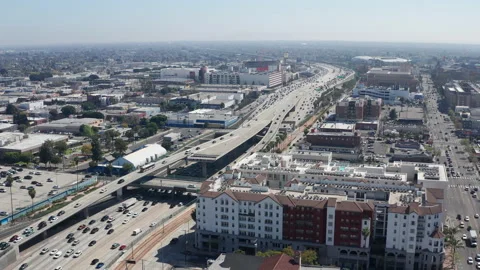 Aerial shot of congested crowded Los Angeles freeway highway car traffic Stock Footage 273753882