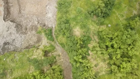 Aerial shot of construction site in Mount Merapi,Yogyakarta, Indonesia Stock Footage 92317433