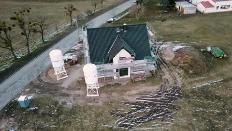 Aerial shot of a construction site of a single-family house in Germany Stock Footage 233899797