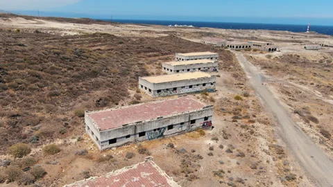 Aerial shot of the constructions of the abandoned leper colony of Tenerife. Stock Footage 228880140