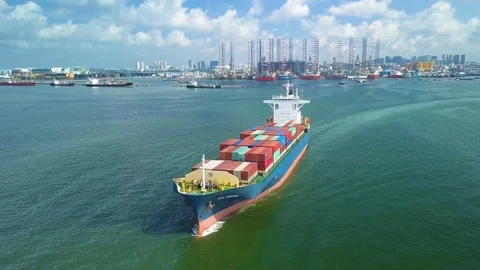 Aerial shot of container ship leaving container port, Singapore Stock Footage 106081732