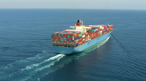 Aerial shot of container ship in ocean Stock Footage
