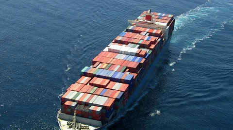 Aerial shot of container ship in ocean Stock Footage