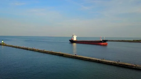 Aerial shot of container ship in sea Видео 79487541