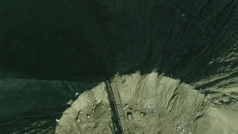 Aerial shot of a conveyor unloading grey sand Stock Footage 79479505