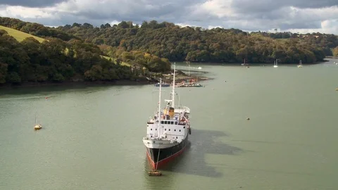 Aerial shot, Cornwall, Tolverne Ferry, Smugglers Restaurant, River Fal Stock Footage 97740653