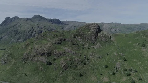 Aerial shot of crags at Blea Tarn in Langdale, Drone, Lake District Stock Footage 93693953