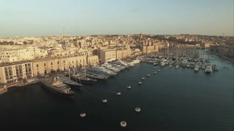 Aerial Shot - Craning down looking towards luxury yachts Stock Footage 61238062