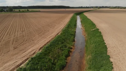 Aerial shot of crops with tractor Stock Footage 89904451
