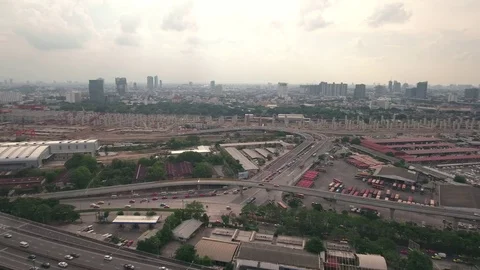 Aerial shot of developing city pan Stock Footage 74853811