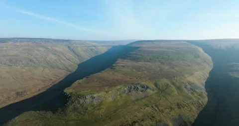 Aerial shot of distant High Cup Nick in Cumbria Video stock 331441455