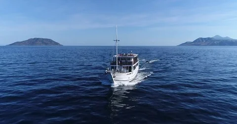 Aerial shot of a dive boat navigating on the water Stock Footage 79555812