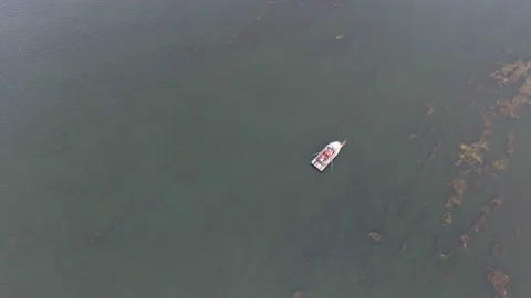 Aerial shot of the Dnipro basin with rowing white motorboat in summer Stock Footage 88047138