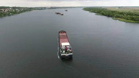 Aerial shot the Dnipro river with a floating barge in the center in summer Stock Footage 87995529