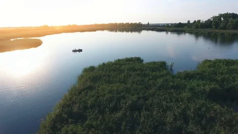 Aerial shot of the Dnipro river islets and inflows at splendid sunset in summer Stock-Footage 84995579